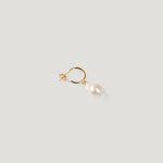 Single gold hoop earring with an irregular baroque pearl drop on light background.