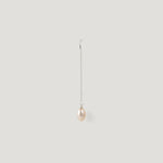 Single silver thread earring with a pearl drop, hanging vertically on light background.