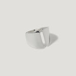 Modern geometric silver ring with open split design on white background
