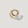 Modern gold ring with organic open circle design on a plain light background