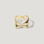 Geometric open gold ring with pointed ends on white background
