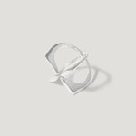 Modern geometric silver ring with open square design on light background