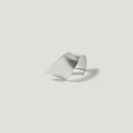 Modern silver sculptural ring with a matte finish on white background
