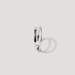 Minimalist silver open ring with a smooth, polished finish on a white background