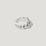 Sterling silver twisted open ring on a white background