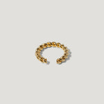 Gold twisted open ring minimalist design on white background
