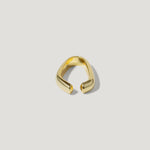 Minimalist open gold ring with smooth, polished finish on white background