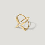 Modern open gold ring with abstract geometric shapes on a light background