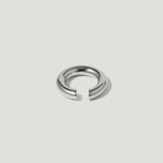 Minimalist silver open ring with polished finish on a plain white background