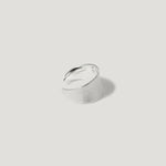 Wide brushed silver adjustable ring on white background