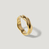 modern wavy gold band ring with polished finish on plain light background