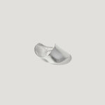 Modern wide sterling silver statement ring with smooth matte finish on white background