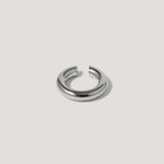 Minimalist silver chunky open ring on a white background