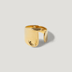 Gold adjustable ring with bold letter J initial on minimalist background