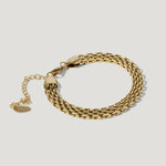 Elegant gold chain bracelet with adjustable clasp on a white background