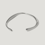 Minimalist silver open cuff bracelet with smooth polished finish on white background