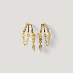 Gold hoop earrings with crystal pavé, chain accents, and geometric dangle charms
