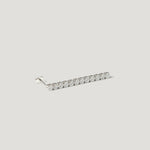 Minimalist silver bar stud earring with clear gemstones on white background